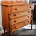 F58. Four-drawer maple Empire style chest. 